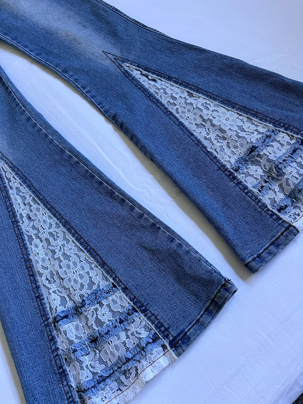 low rise flared lace detail jeans