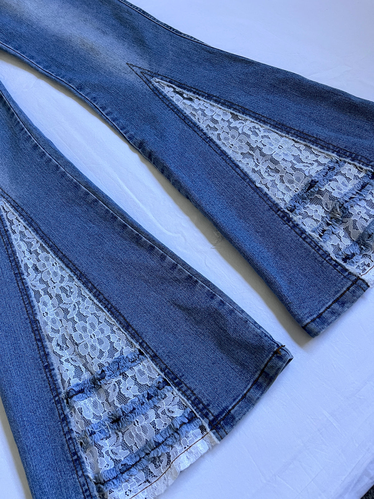 low rise flared lace detail jeans