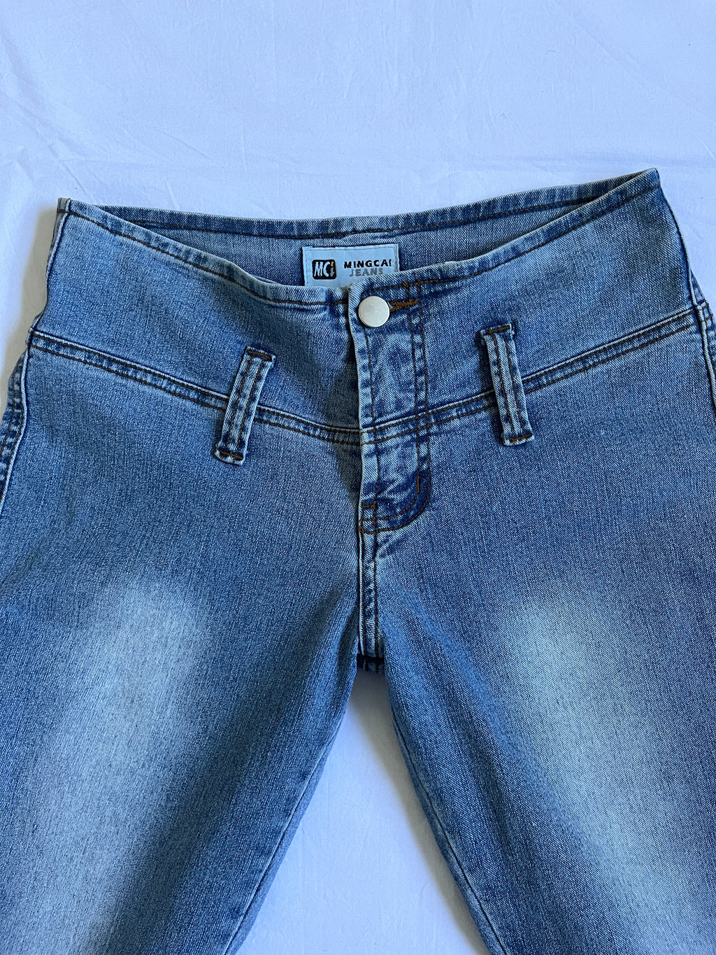 low rise flared lace detail jeans