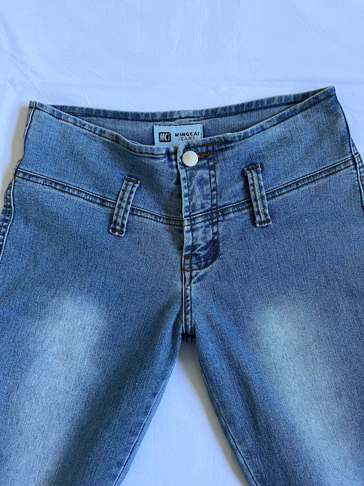 low rise flared lace detail jeans