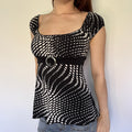 black & white polka dot babydoll top