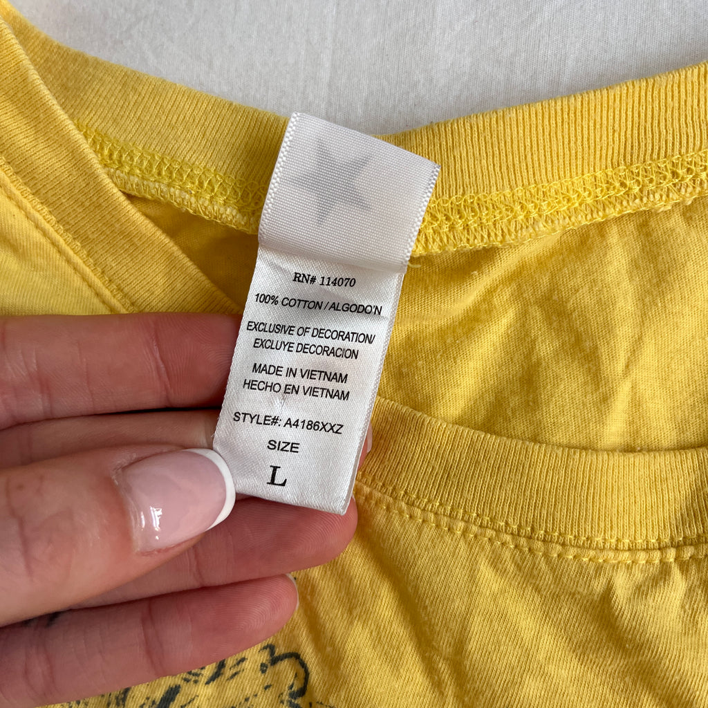 grungy yellow cross baby tee