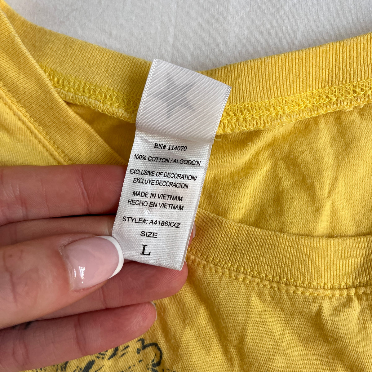grungy yellow cross baby tee