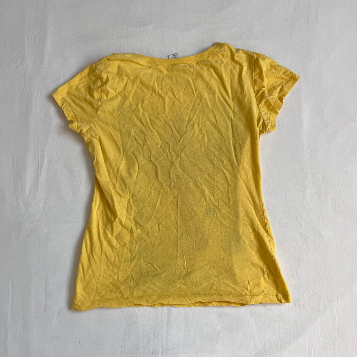 grungy yellow cross baby tee