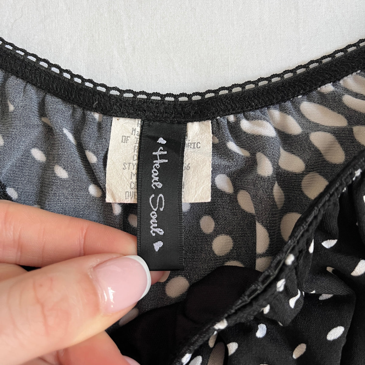 black & white polka dot babydoll top