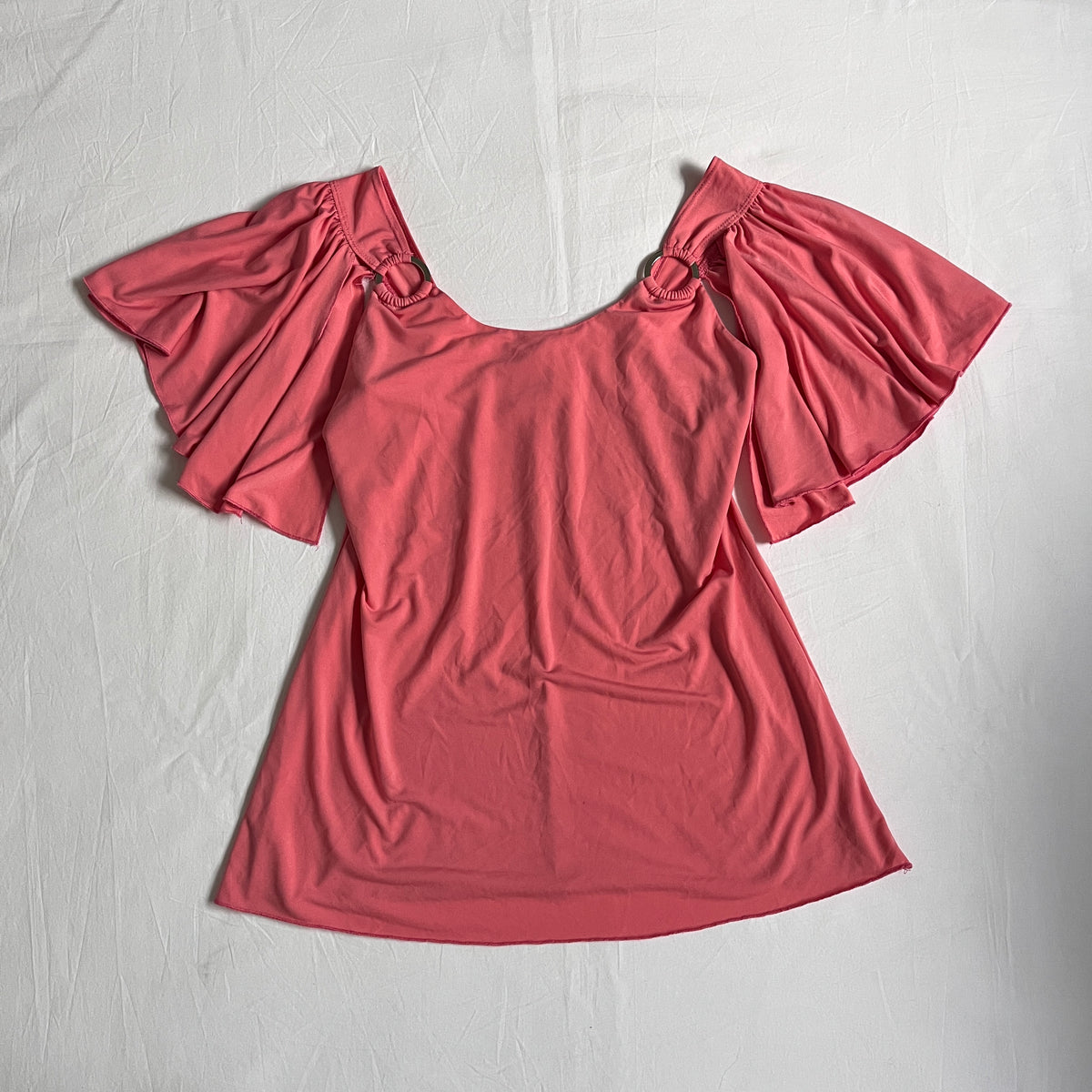 pink batwing style top
