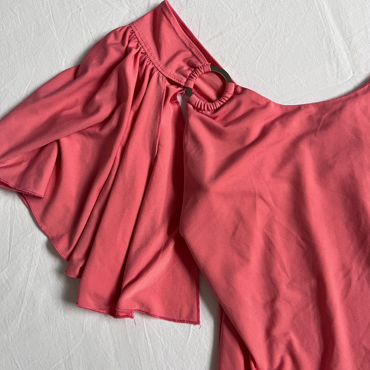 pink batwing style top