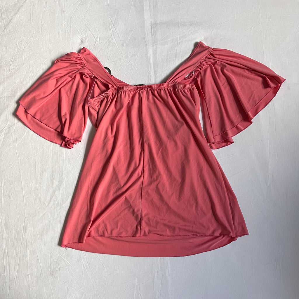 pink batwing style top