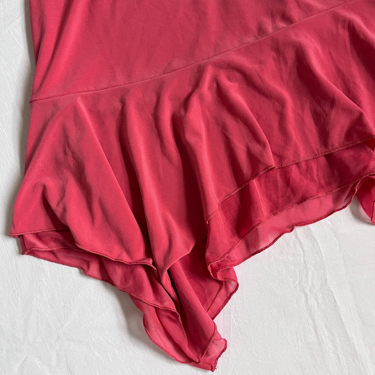 pink asymmetrical mini skirt