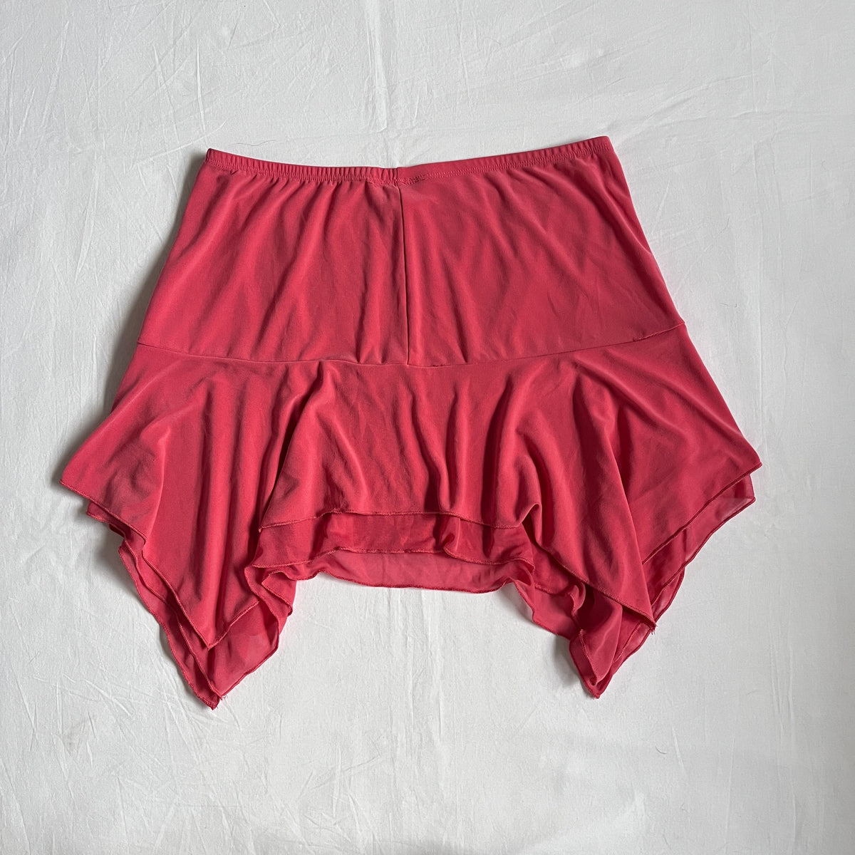 pink asymmetrical mini skirt